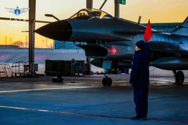 The fighter plane took off in the morning glow, it was so exciting! 