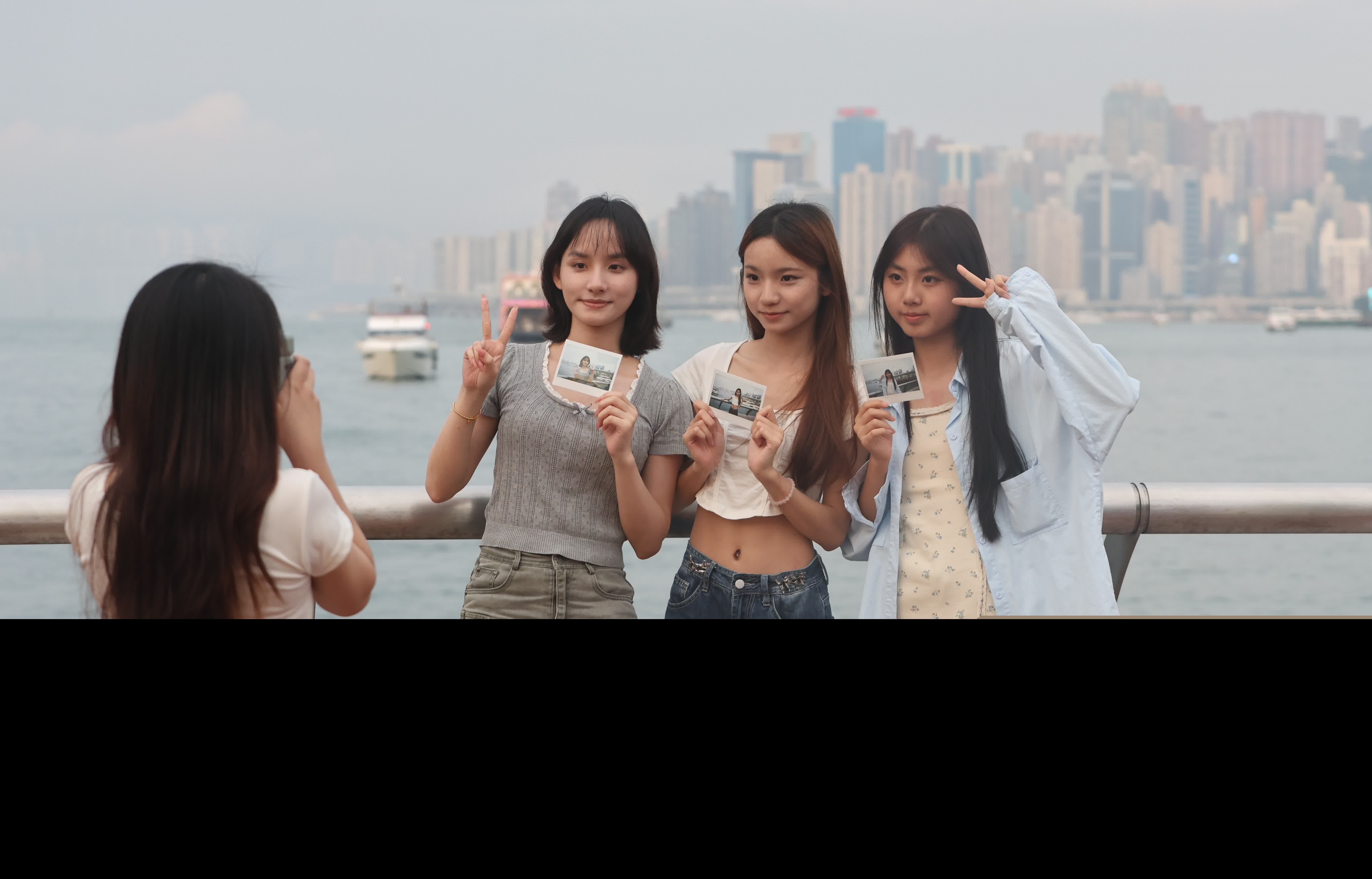 五一黃金周，中區吸引大批旅客旅遊打卡。（香港文匯報記者曾興偉 攝）