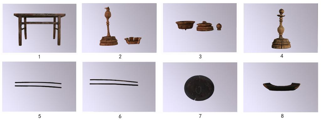 这是该墓葬出土的木质供桌及上面摆放的3个烛台、2双箸、2件盘。(大同市考古研究所供图)